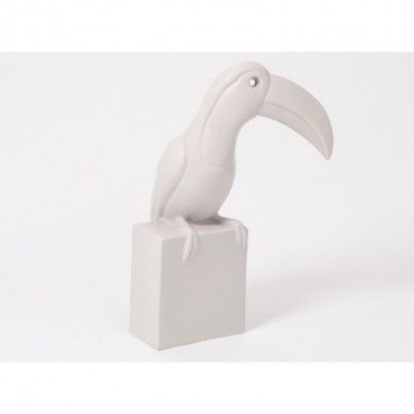 Toucan estátua cinza esteira sombra taupe