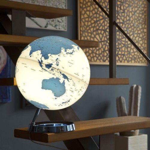 Design brilhante globo brilhante branco azul elétrico na base de cor azul