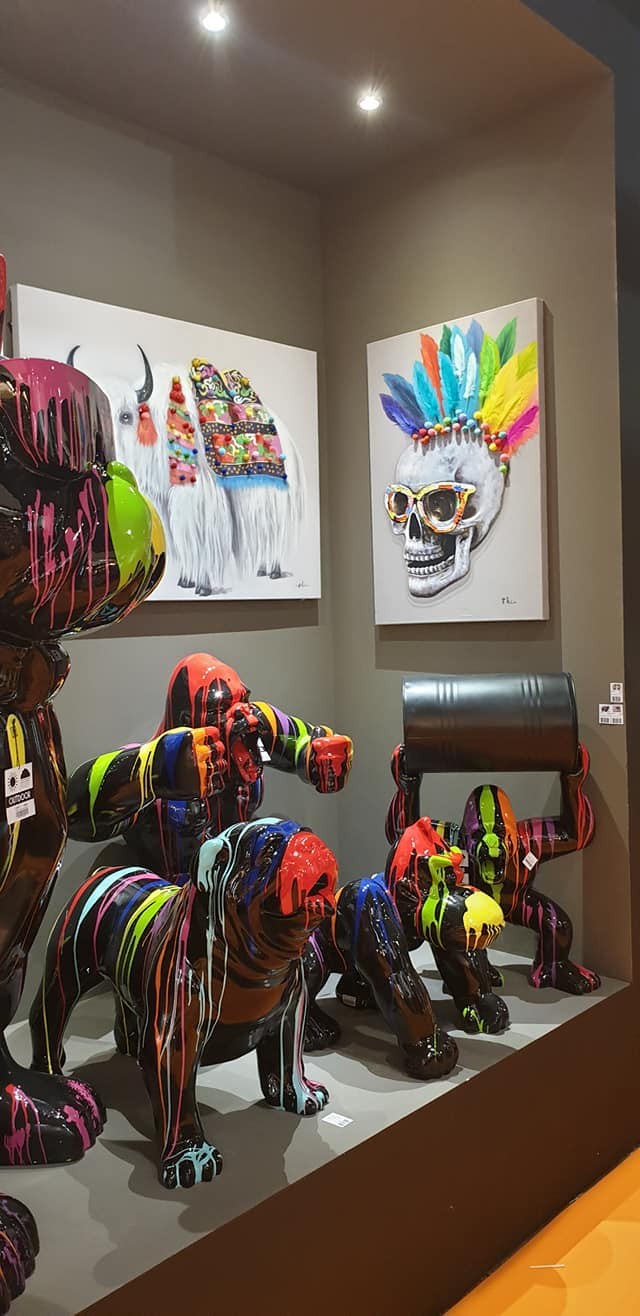 Two wall pictures COLORE skulls and feathers DRIMMER — both canvases displayed with other works not included