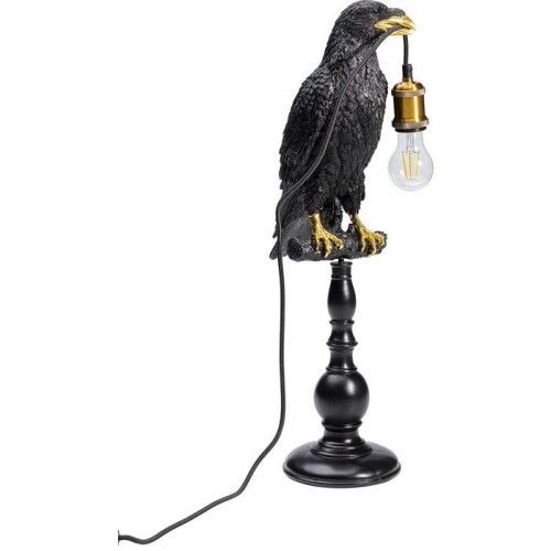 Pássaro preto pose lâmpada corvo o corvo