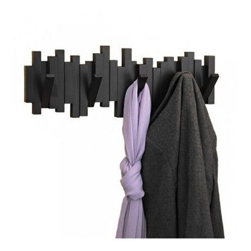 Halter Mantel Sticks Schwarze Wand Umbra