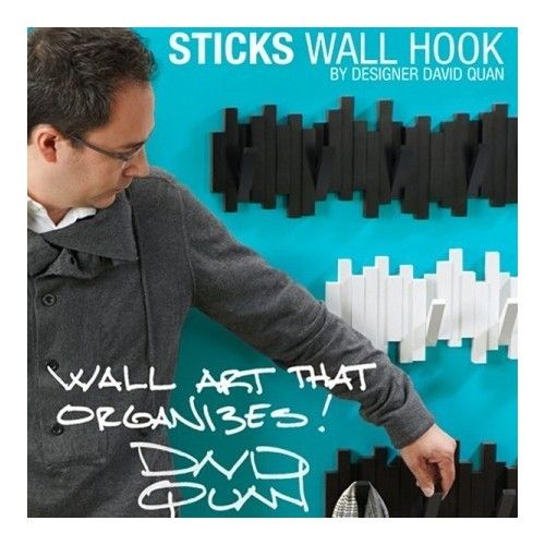 Halter Mantel Sticks Schwarze Wand Umbra