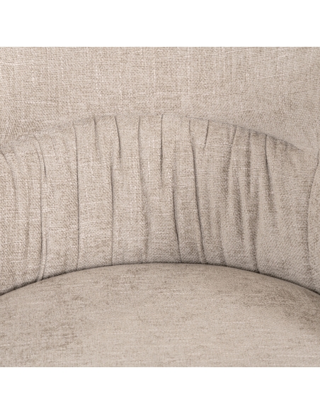 Detail of the decorative pleats on the backrest of the OLIVIA chair in beige fabric