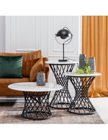 Coffee table CRYSTAL round marble-look top with black metal IXIA — styled in a living room